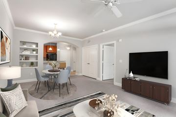 Fayetteville apartment for rent - A modern living room with a dining table and chairs.