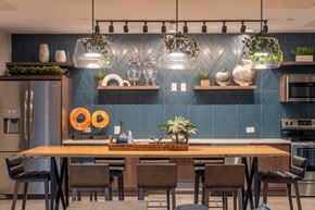 Arlington Heights apartment for rent - Modern kitchen with herringbone tile backsplash at Dunton Tower Apartments, Arlington Heights
