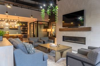 Resident lounge with fireplace and television