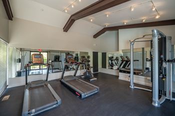 Fitness room with cardio and weight machines