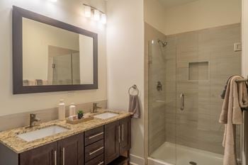 Double sink vanities with framed bathroom mirrors*