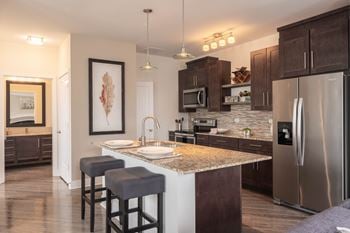 Gourmet kitchen with white or espresso cabinetry