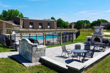 Outdoor living space with gas grill & fireplace