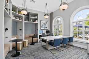 Vernon Hills apartment for rent - Coworking lounge with builtin booth seating and arched windows at TLC Management Apartments, Illinois