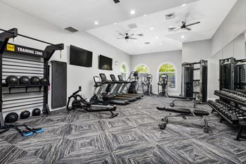 Fitness center with cardio equipment and free weights