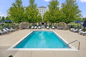 Vernon Hills apartment for rent - Outdoor swimming pool with cabanas and lounge deck at TLC Management Apartments, Vernon Hills, IL 60061