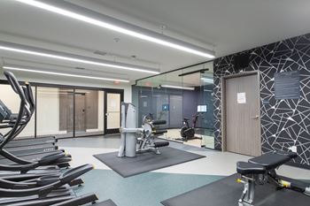 24/7 Fitness center w/ yoga studio