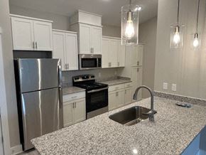 Hickory apartment for rent - a kitchen with stainless steel appliances and granite counter tops