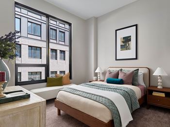 Light gray custom carpeting in bedrooms