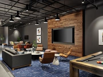 Philadelphia apartment for rent - A modern living room with a pool table and a television.