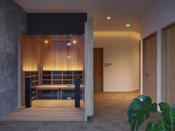 Rejuvenating spa with sauna, steam shower, and massage tables