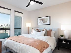 Phoenix apartment for rent - a bedroom with a large bed and a ceiling fan at AVE Phoenix Terra, Arizona, 85003