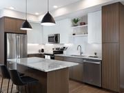 Phoenix apartment for rent - a kitchen with a island and a stainless steel refrigerator at AVE Phoenix Terra, Arizona, 85003