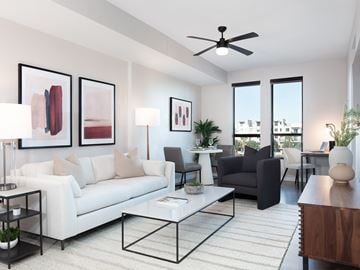 Phoenix apartment for rent - a living room with a white couch and a coffee table