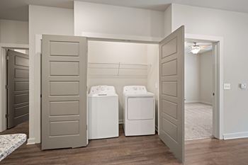 A laundry room with washers 