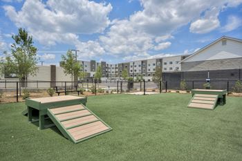 Our apartments have a spacious dog park with picnic tables