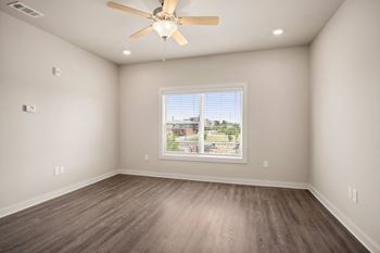 Bedroom with fan and light