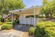 Augusta townhouse for rent - A white covered mailbox is situated in front of a house.