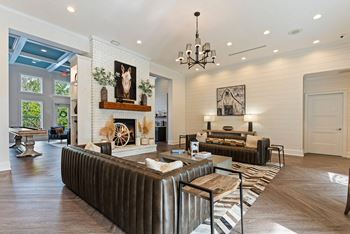 A living room with a fireplace and a couch