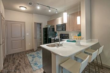 Oklahoma City apartment for rent - a kitchen with a counter top and a sink