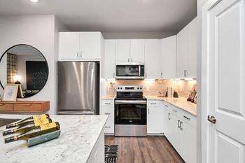 Granite countertops with subway tile backsplash