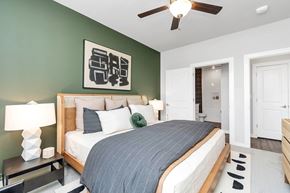 Montgomery apartment for rent - Apartment bedroom with ceiling fan and door open to a bathroom