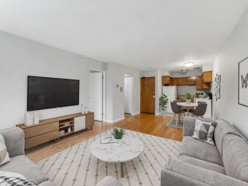 Chicago apartment for rent - a living room with a couch and a coffee table