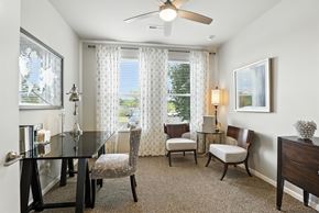 Des Peres apartment for rent - A well-lit dining room with a table set for four at Alinea Town and Country Luxury Apartments in Des Peres MO 63131..