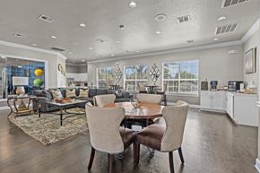 San Antonio apartment for rent - A modern dining room with a table set for two.