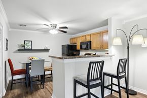 Ballwin apartment for rent - A kitchen with a table and chairs.