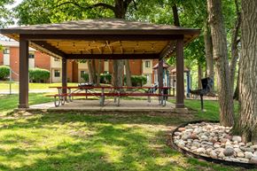 St. Louis apartment for rent - a gazebo with a picnic table and a fire pit