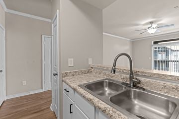New Braunfels apartment for rent - A kitchen with a sink and a window.