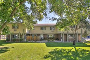 Fort Collins apartment for rent - Village on Leisure exterior featuring large shared green area