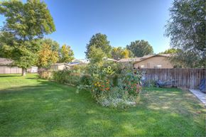 Fort Collins apartment for rent - Village on Leisure exterior featuring flowers and greenery