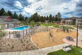 Fort Collins apartment for rent - Clubhouse, pool, and playground at Village on Plum
