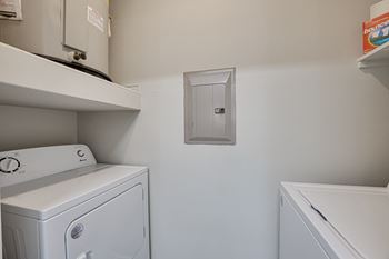 Laundry room with a washer and dryer