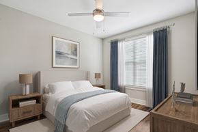 Cypress apartment for rent - Bedroom with ceiling fan and window treatments at Highline Urban Lofts Apartments, Cypress, 77429