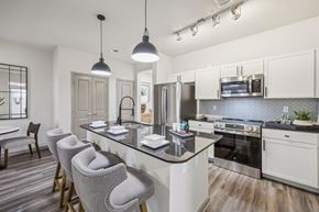 Grapevine apartment for rent - kitchen with granite countertop at Vine + Vail Townhomes and Apartments, Grapevine, 76051