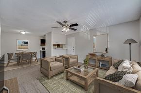 Cleburne apartment for rent - Open concept living and dining area with modern furnishings at Arbors Of Cleburne Apartments, Cleburne, 76033