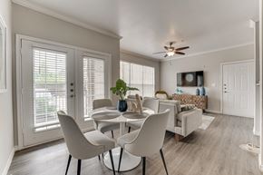 Dallas apartment for rent - Dining And Living Area at The Brazos, Dallas, TX, 75287