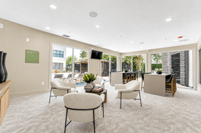 Dallas apartment for rent - Community clubroom with patio access and seating at The Barton Apartments, Dallas, TX