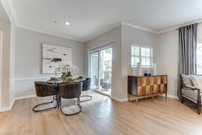 Lewisville apartment for rent - Dining room with modern furniture and balcony access at Limestone Ranch Apartments, Lewisville, 75067