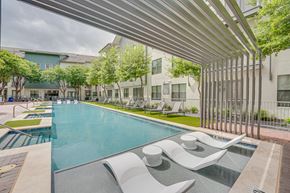 Dallas apartment for rent - Pool area with tanning ledge and modern pergola at The Montrose Apartments, Dallas, 75204