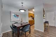 Fort Worth apartment for rent - dining room with a wooden table and chairs at Southern Oaks, Fort Worth Texas