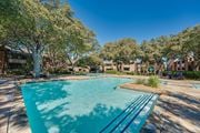 Fort Worth apartment for rent - swimming pool surrounded by houses at Southern Oaks, Fort Worth, 76132