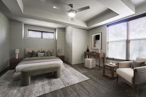Grapevine apartment for rent - A modern bedroom with a vanity and a sofa