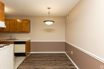 Simpsonville apartment for rent - A kitchen with a white dishwasher and a white oven.