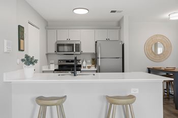 Sleek stainless steel appliance package