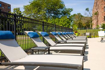 Two outdoor pools with oversized sundecks