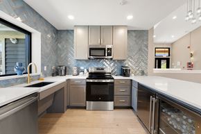 Lisle apartment for rent - A modern kitchen with a stainless steel dishwasher and oven.